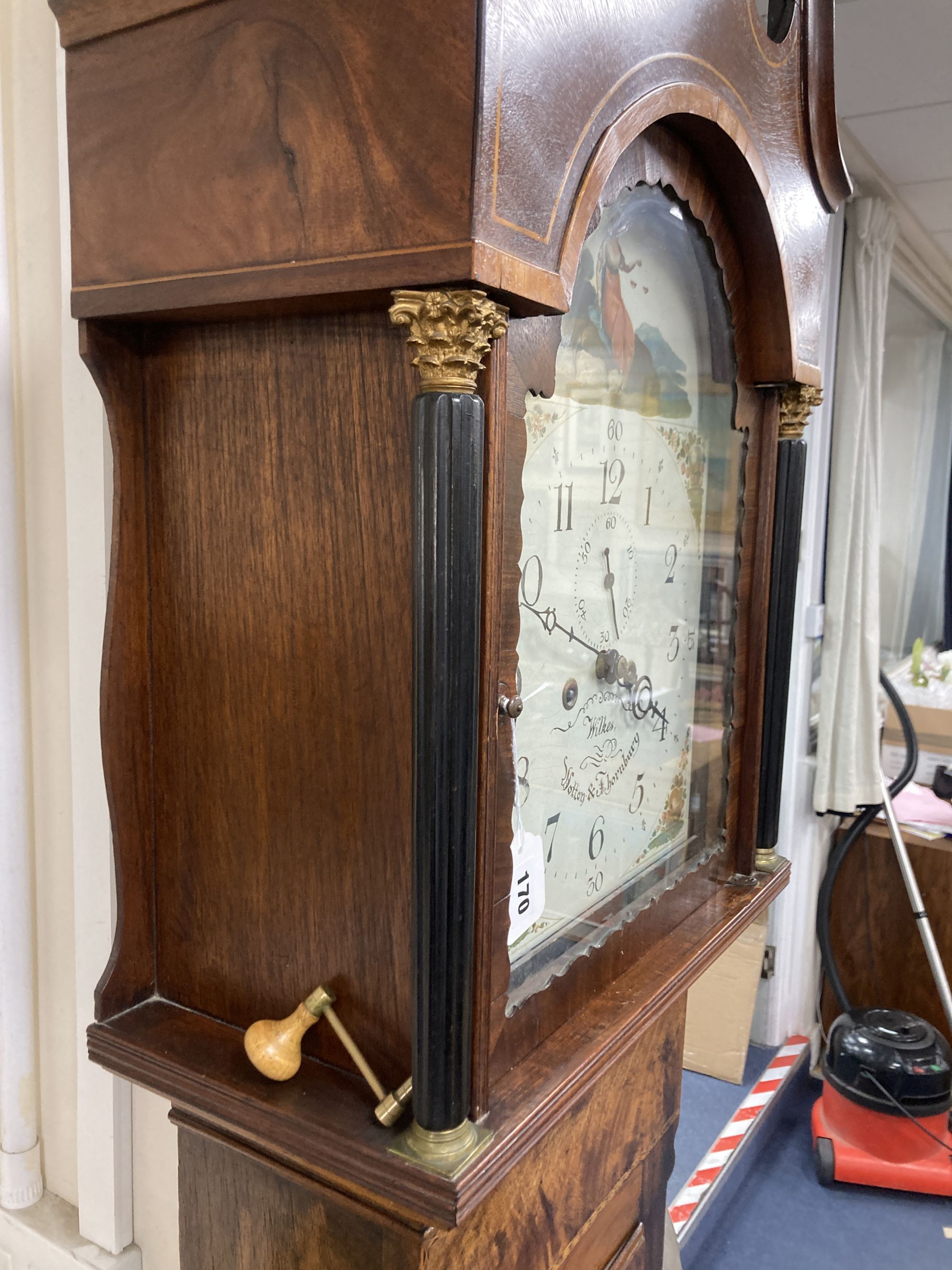 An early 19th century mahogany eight day longcase clock, height 217cm